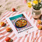 Paella Valenciana – on Striped Tablecloth, Spanish Food Painting, unframed on coastal sand