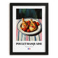 Poulet Basquaise – on Striped Tablecloth, French Food Painting, in sleek black frame