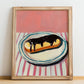 Éclair – on Striped Tablecloth, French French Pastry Still Life, no-text version framed in wood