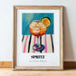 Spritz – on Striped Tablecloth, Italian Cocktail Poster, in wooden frame leaning on the floor