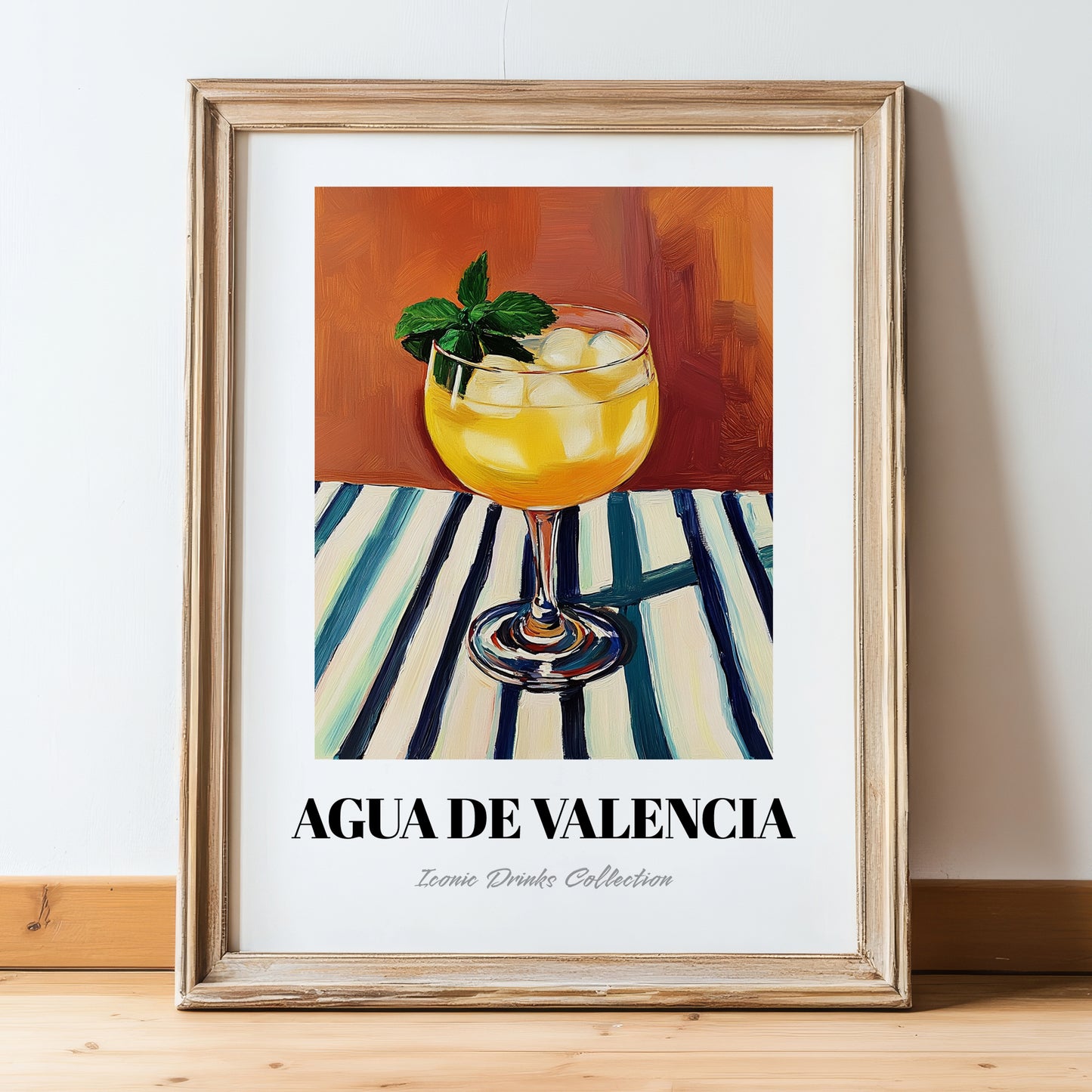 Agua De Valencia – on Striped Tablecloth, Spanish Cocktail Wall Art, in wooden frame leaning on the floor