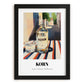 Korn – German Street Café Scene, German Spirit Wall Print, in sleek black frame