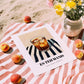 Es Teh Manis – on Striped Tablecloth, Indonesian Cocktail Print, unframed on coastal sand