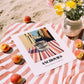 Anchovies – Italian Street Café Scene, Canned Food Print, unframed on coastal sand
