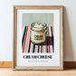 Cream – on Striped Tablecloth, Cheese Print, in wooden frame leaning on the floor