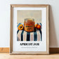 Apricot Jam – on Striped Tablecloth, Jam Wall Print, in wooden frame leaning on the floor