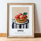 Apple – on Striped Tablecloth, Fruit Painting, in wooden frame leaning on the floor