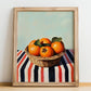 Persimmon – on Striped Tablecloth, Fruit Still Life, no-text version framed in wood