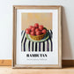 Rambutan – on Striped Tablecloth, Vegetable Wall Decor, in wooden frame leaning on the floor