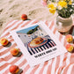 White Bread – White village Street Café Scene, American Food Print, unframed on coastal sand