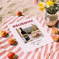 Bolgheri DOC – Italian Red Wine, Vinoteca Print, unframed on coastal sand