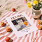 Licuado – Mexican Beverage Drink, Rooftop Terrace Poster, unframed on coastal sand