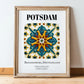 Potsdam, Germany – Travel Poster, in wooden frame leaning on the floor